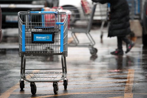 A shopping cart sits outside a Walmart store January 11, in Chicago, Illinois. Photo: Scott Olson / Getty Images