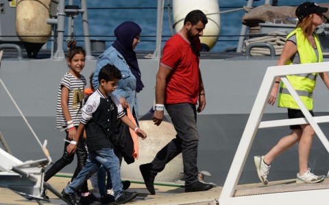 The migrants - including 18 minors and 17 women - will be sent on to various European host countries. Photo: AFP