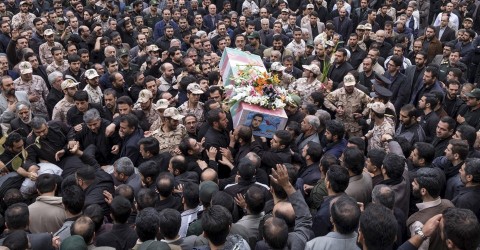 Mourners carry the coffin of an Iranian Revolutionary Guard Corps soldier killed in Syria in 2015 Photo: Raheb Homavandi / Reuters
