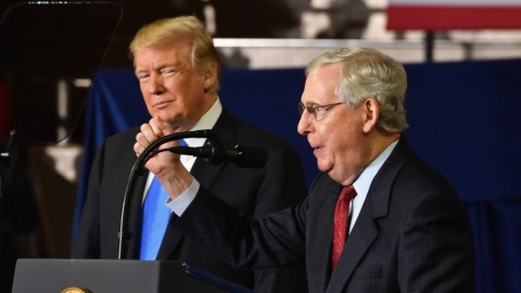 McConnell speaks as Donald Trump looks on during a rally in Richmond, Kentucky October 13, 2018. Photo: Nicholas Kamm / AFP / Getty Images