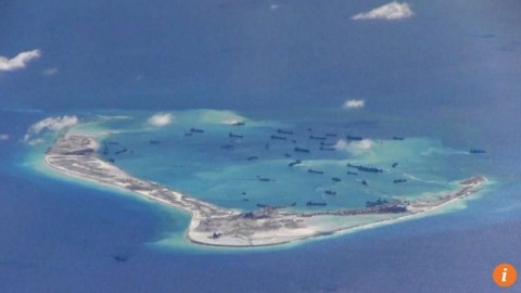 China finishing South China Sea buildings that may house missiles, say US officials